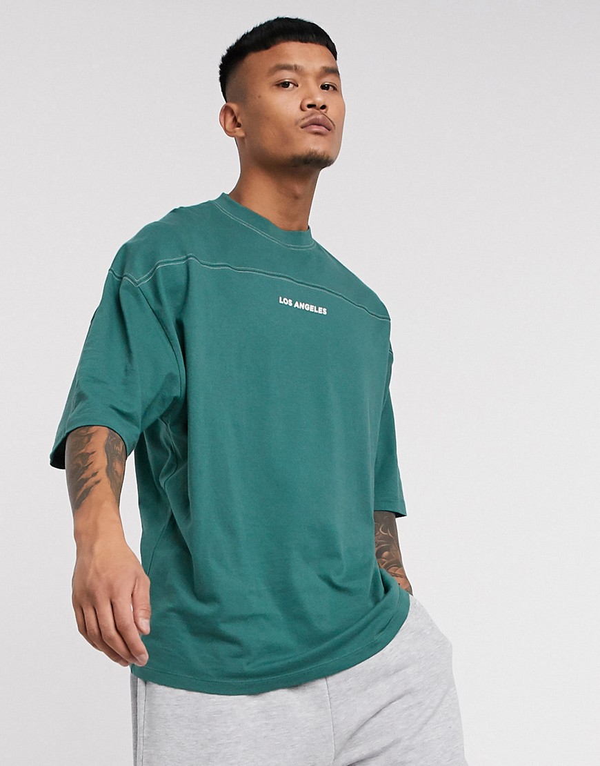 ASOS DESIGN organic cotton oversized longline t-shirt with contrast stitching and city print-Green