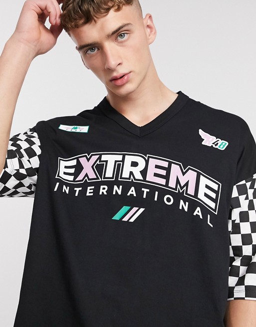 ASOS DESIGN organic cotton oversized v neck t-shirt with motocross and checkerboard print