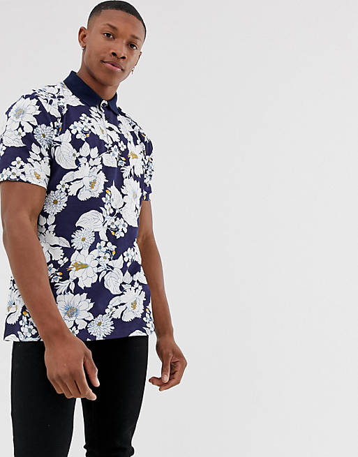 ASOS DESIGN organic cotton relaxed fit polo with all over floral print ...