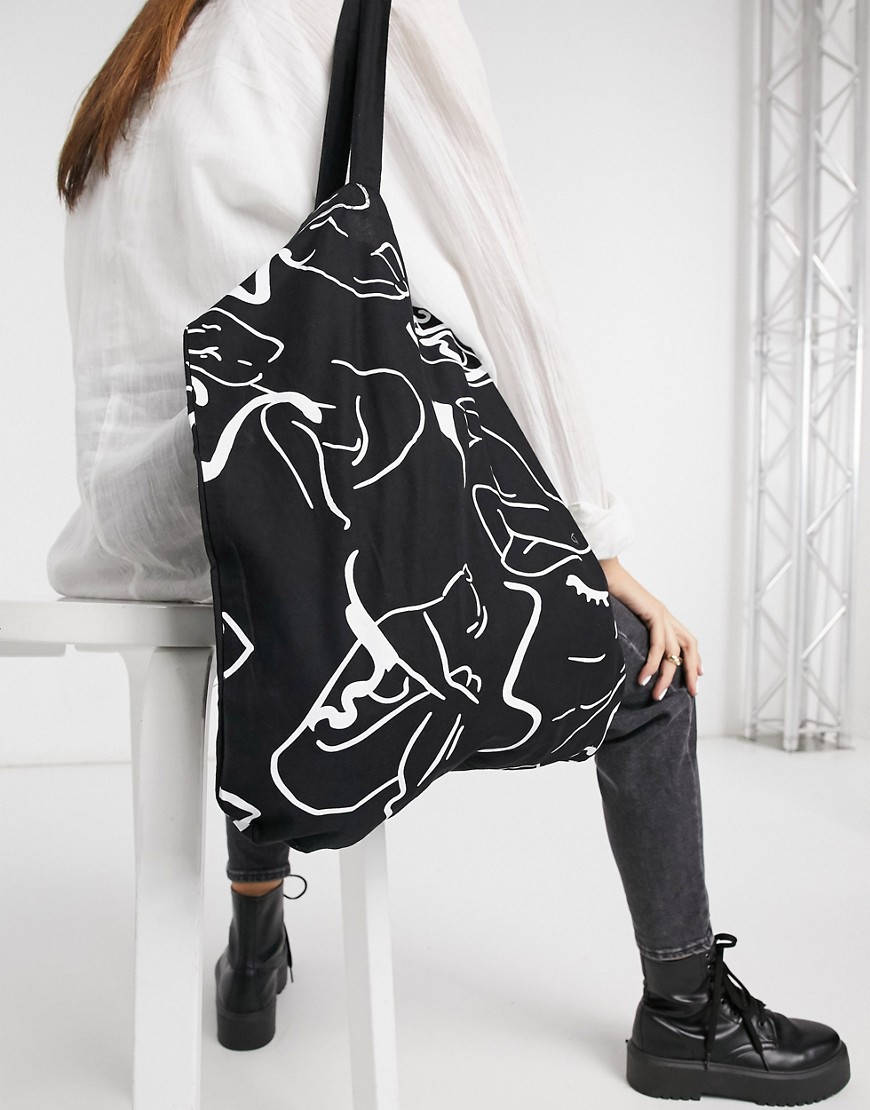 ASOS DESIGN organic cotton shopper bag in abstract body print-Black