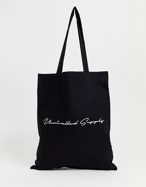 ASOS DESIGN organic cotton tote bag in black with text print