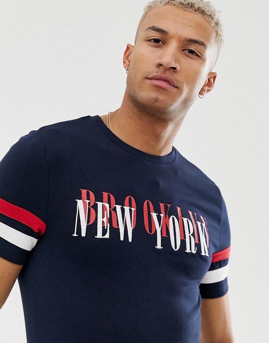 ASOS DESIGN organic cottton muscle fit t-shirt with colour block sleeve stripe and chest print-Navy