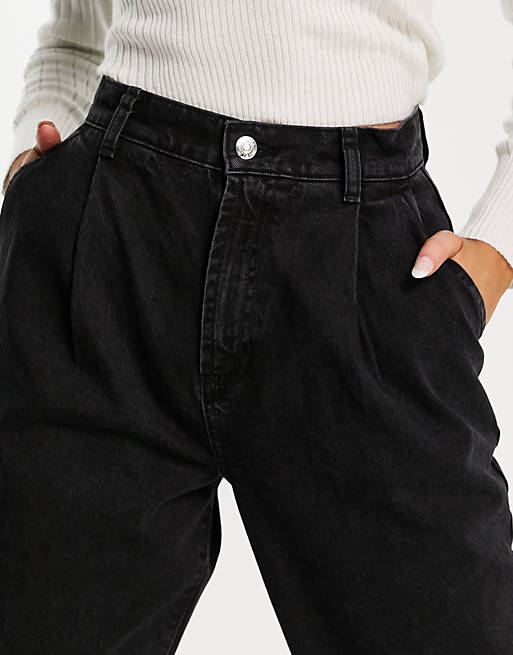 Women organic denim pleat front peg trouser in washed black 
