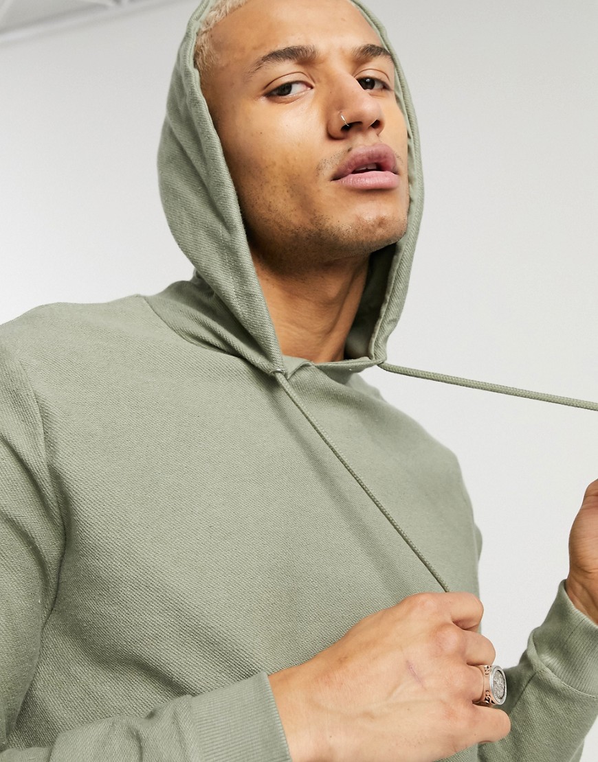 ASOS DESIGN organic hoodie in green reverse loopback