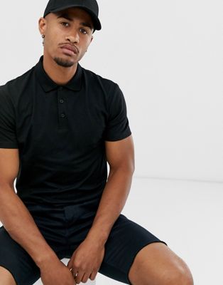 black polo and shorts