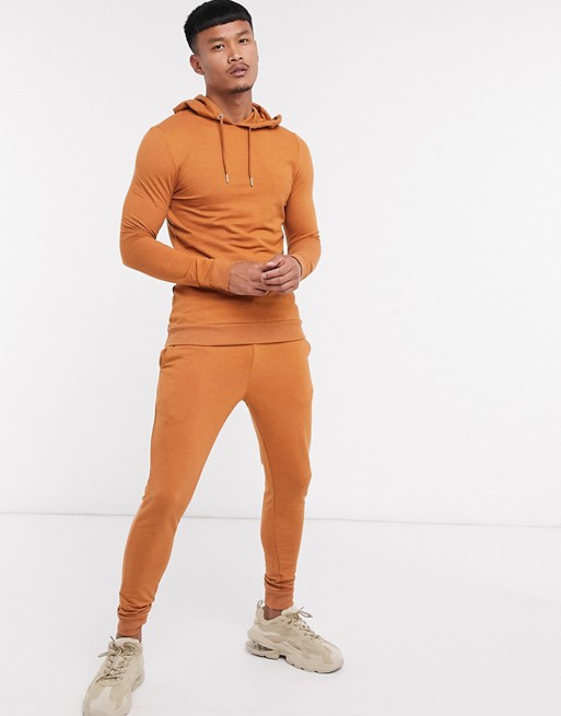 ASOS DESIGN organic muscle tracksuit with hoodie in brown