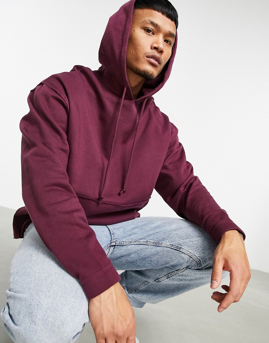 ASOS DESIGN organic oversized hoodie with curved hem in burgundy-Red
