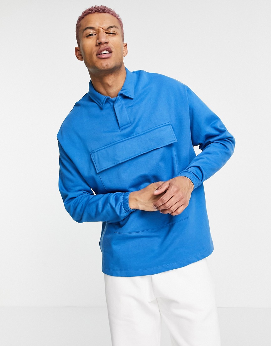 ASOS DESIGN organic oversized sweatshirt with revere collar & pocket detail in blue-Blues
