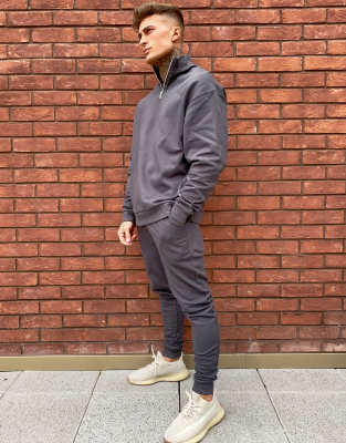 ASOS DESIGN organic oversized tracksuit with half zip sweatshirt in washed black