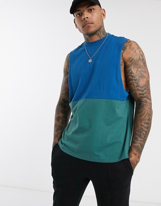 ASOS DESIGN organic relaxed sleeveless t-shirt with dropped armhole and contrast yoke in green