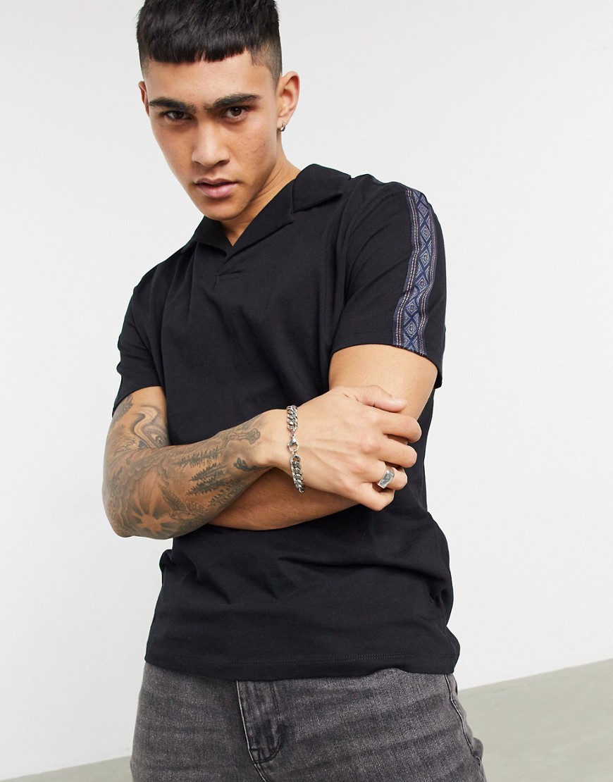 ASOS DESIGN organic revere polo shirt with contrast tape in black