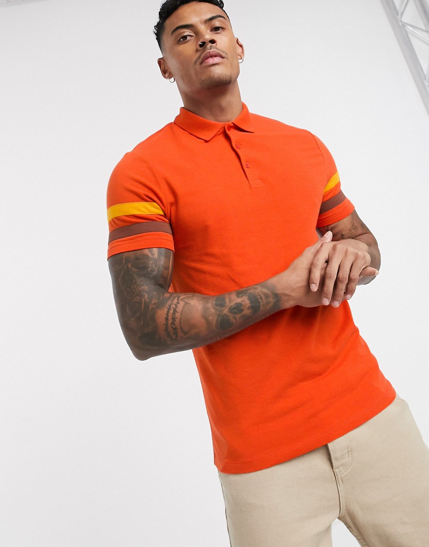 ASOS DESIGN organic skinny polo shirt with contrast sleeve stripes in red-Orange