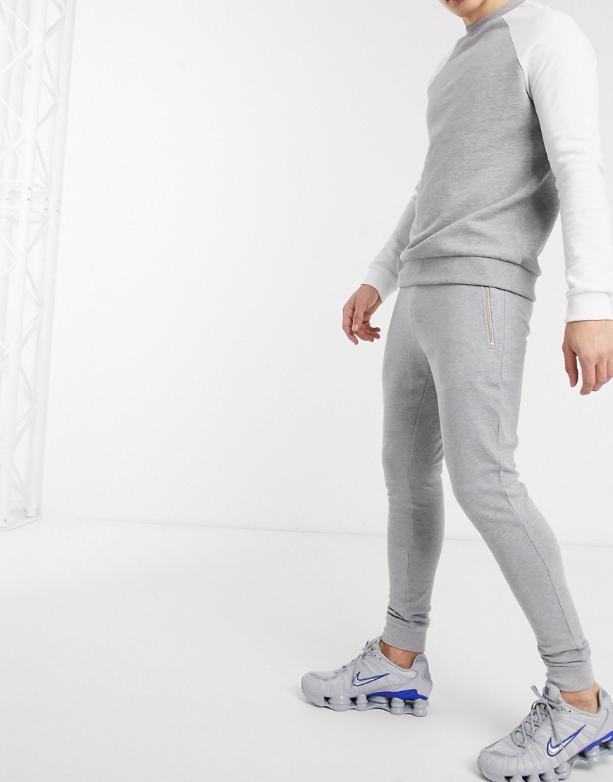 ASOS DESIGN organic super skinny joggers in grey marl with gold zip pockets