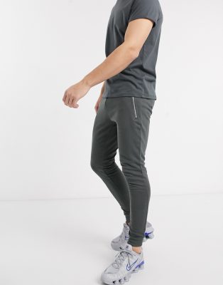 skinny joggers with zip pockets