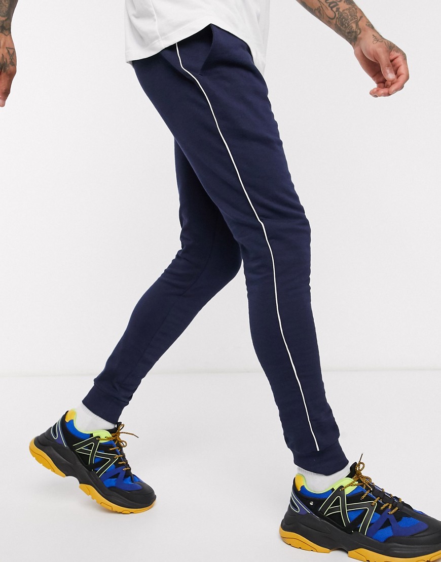 ASOS DESIGN ORGANIC super skinny joggers with piping in navy