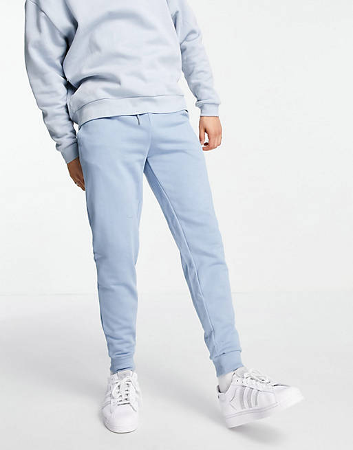 ASOS DESIGN tapered joggers in blue - MBLUE