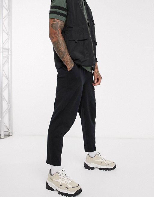 ASOS DESIGN organic tapered joggers with pleats in black