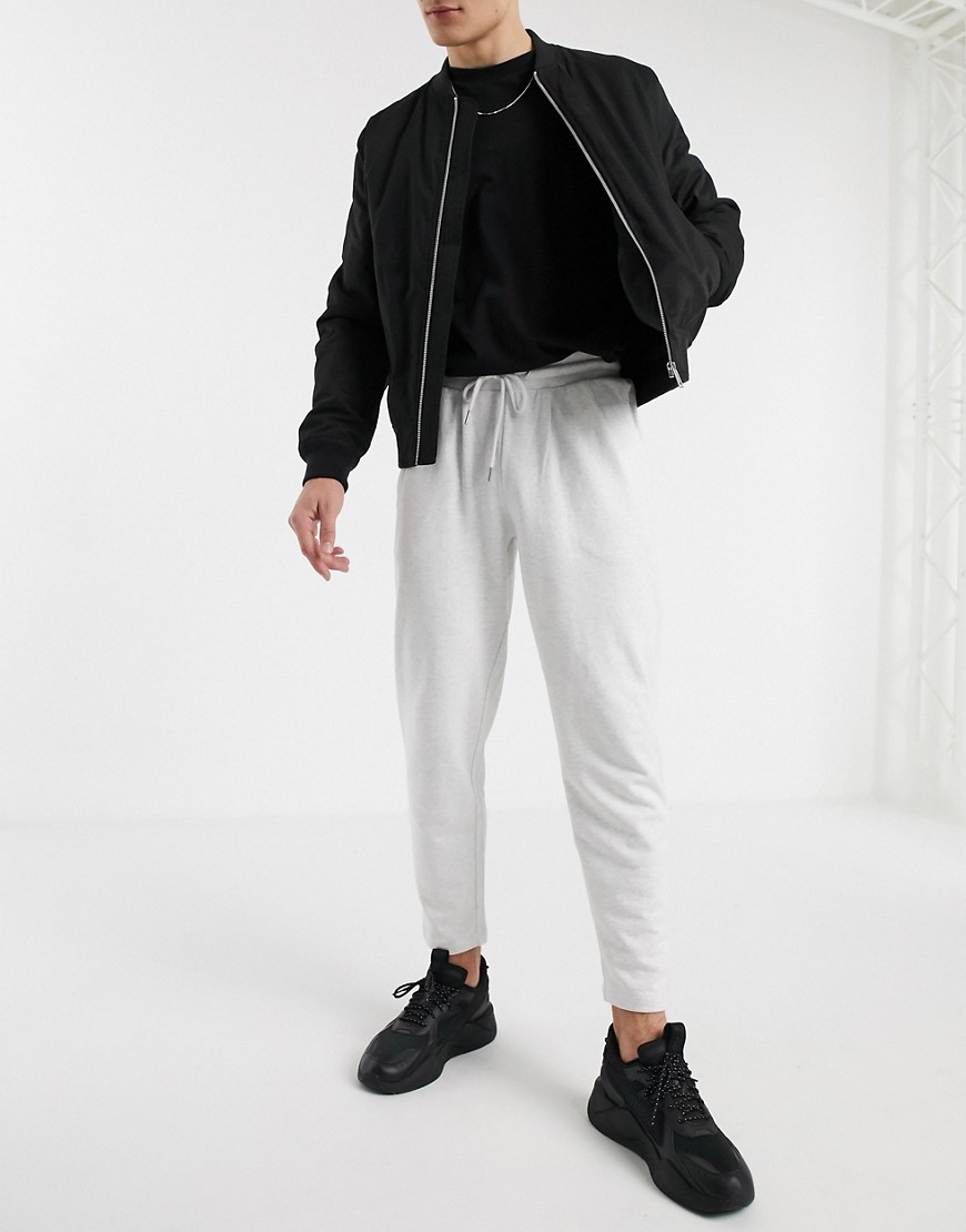 ASOS DESIGN organic tapered joggers with pleats in white marl