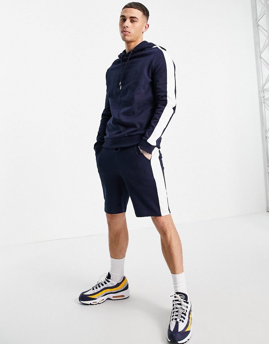 ASOS DESIGN organic tracksuit with hoodie & shorts with side stripe in navy