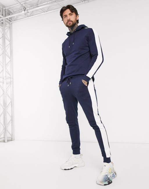 ASOS DESIGN organic tracksuit with hoodie & side stripe in navy | ASOS