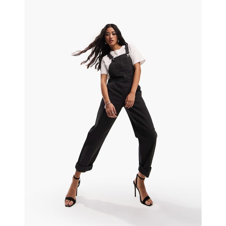 ASOS DESIGN Skinny Denim Dungarees In Black, $50, Asos