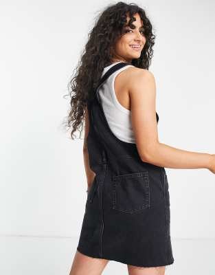 black overall dress with buttons