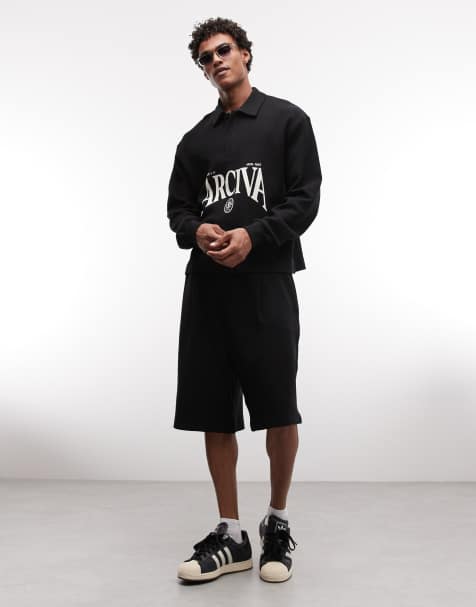 ASOS DESIGN – Ottoman – Svart set i texturerad jersey med shorts och avslappnad, boxig pikétröja med texttryck - view 1