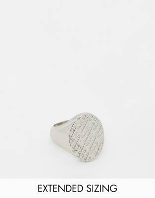 ASOS DESIGN oval signet ring with lightning bolt emboss in silver tone ...