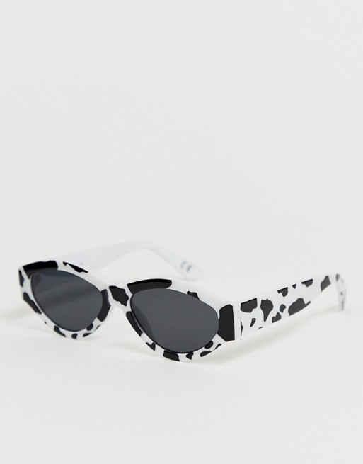 ASOS DESIGN oval sunglasses in cow print