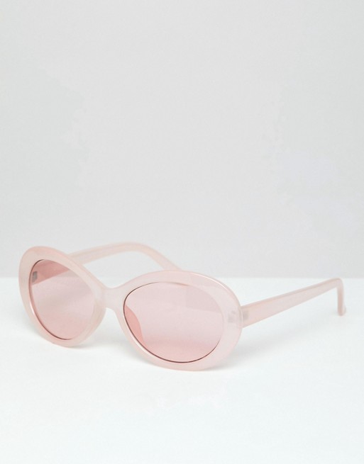 ASOS DESIGN oval sunglasses in pink with pink lens