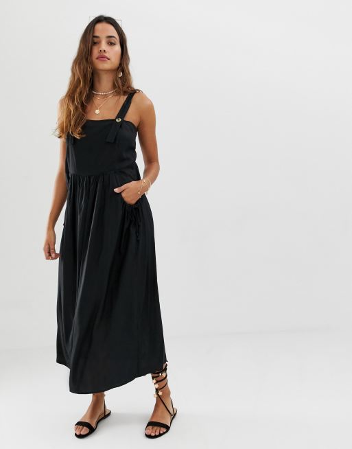 black overall midi dress