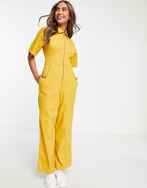 ASOS DESIGN - Overall van keperstof met rits voor in mosterdgeel met wassing 