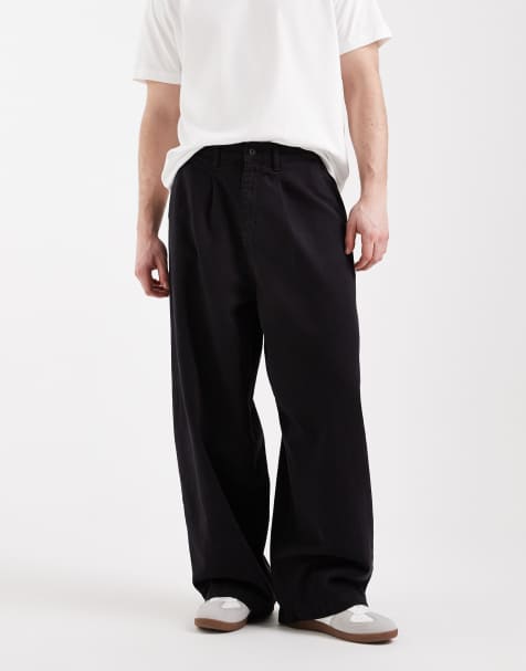 ASOS DESIGN – Oversize-Baggy-Hose in Schwarz mit Bundfalten - view 1