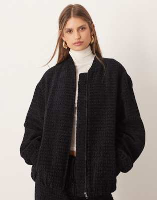 ASOS DESIGN - Oversize-Bomberjacke aus Bouclé in Schwarz mit Rückseite in Wickeloptik, Kombiteil