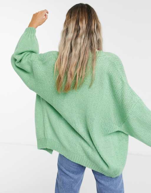 ASOS DESIGN oversized cardigan with pockets in green