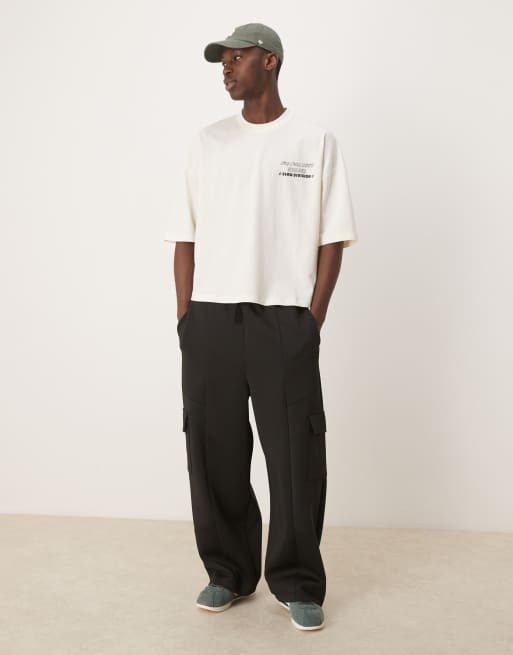 ASOS DESIGN oversize drop shoulder T-shirt with slow Sunday graphic in off white