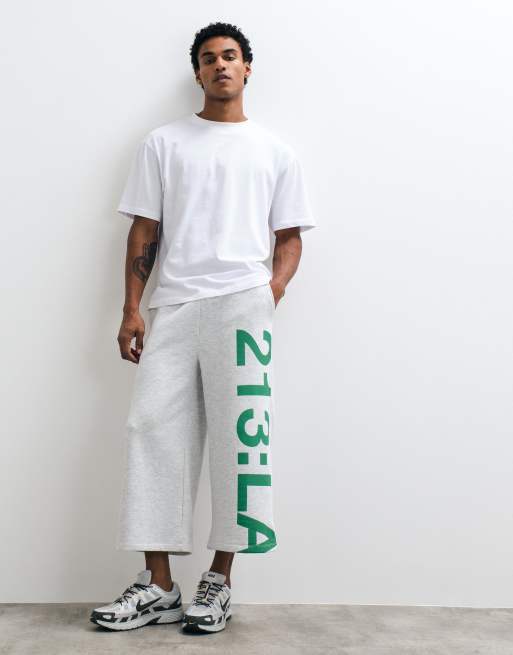 ASOS DESIGN oversize długie dżorty z lamówką i wzorem w jasnoszarym kolorze, 1 z 5
