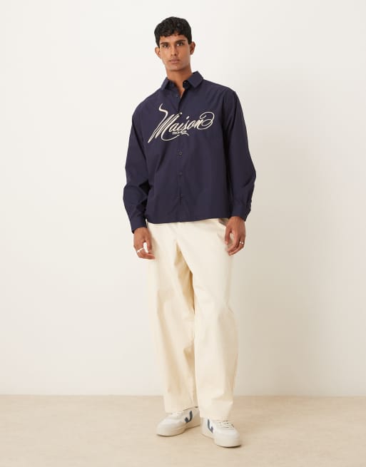 ASOS DESIGN – Oversize-Hemd aus Baumwoll-Popeline in Marineblau mit Stickerei auf der Brust, 2 von 5