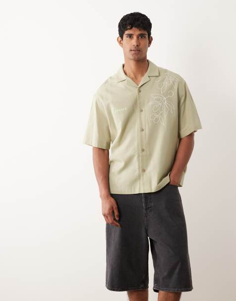 ASOS DESIGN – Oversize-Hemd in Khaki mit Leinenanteil und Blumenmuster - view 1