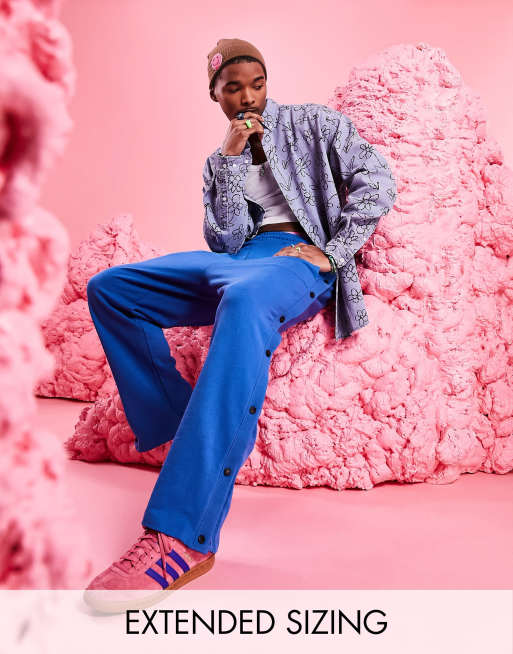 ASOS DESIGN – Oversize-Jeanshemd im 90er-Stil mit Gänseblümchenmuster