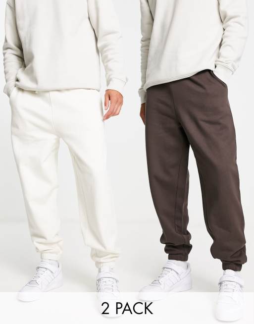 ASOS DESIGN – Oversize-Jogginghose in Dunkelbraun/weichem Weiß, 2er-Pack