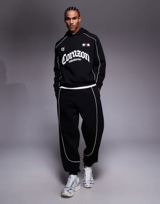 Oversize-Jogginghose in Schwarz mit Paspelierung Schwarz S