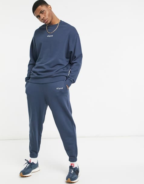 ASOS DESIGN – Oversize-Jogginghose in verwaschenem Marineblau mit Textprint, Kombiteil - view 1