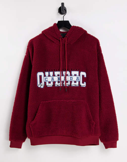 ASOS DESIGN – Oversize-Kapuzenpullover aus Teddyfell in Burgunderrot 