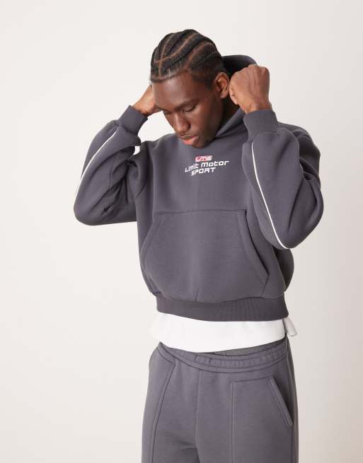 ASOS DESIGN – Oversize-Kapuzenpullover in Anthrazit mit überschnittener Schulter, Paspelierung und Aufdruck