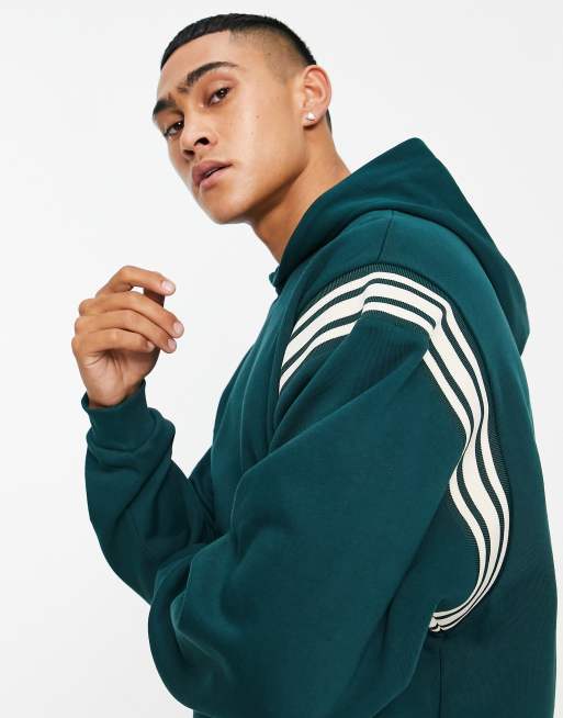 ASOS DESIGN – Oversize-Kapuzenpullover in Dunkelgrün mit Kontraststreifen 