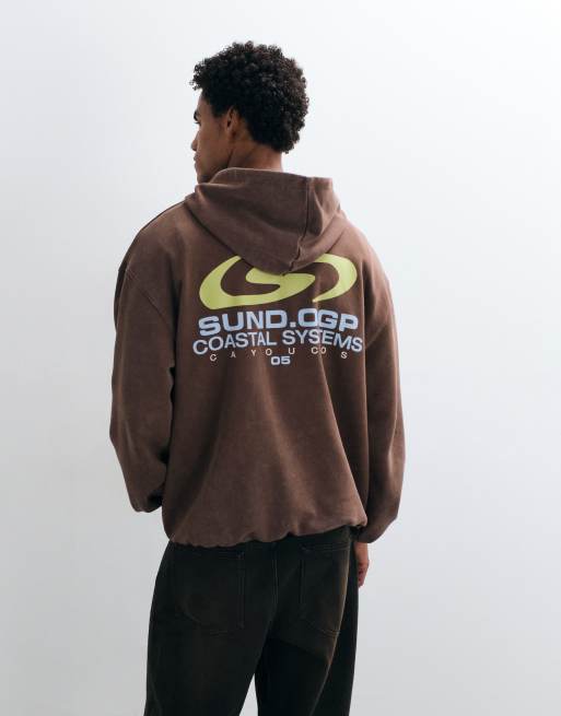 ASOS DESIGN Oversize-Kapuzenpullover in gewaschenem Braun mit Grafik, 2 von 5