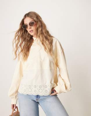 ASOS DESIGN - Oversize-Kapuzenpullover in gewaschenem Creme mit Stickerei-Bunt