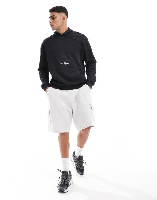 ASOS DESIGN – Oversize-Kapuzenpullover in gewaschenem Schwarz mit „Los Angeles“-Textprint, 3 von 4