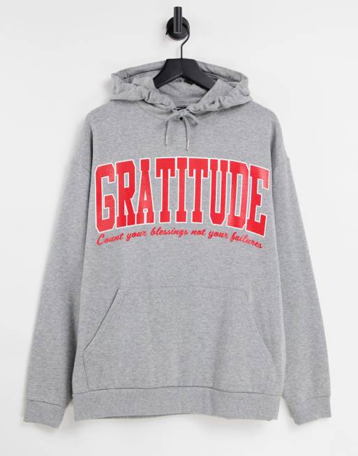 ASOS DESIGN – Oversize-Kapuzenpullover in Kalkgrau mit großem College-Print